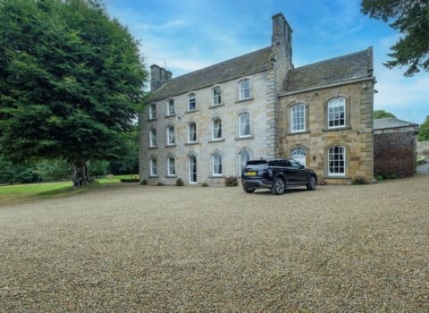 Attractive nine bedroom 17th Century Northumberland home on the market